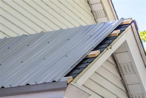 old houses with metal roofs|reroof over existing metal roof.